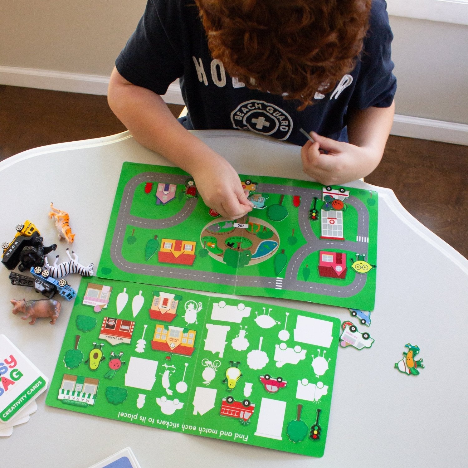 Avi's Adventures In The City Reusable Sticker Book + Marker Set (ages 3+)