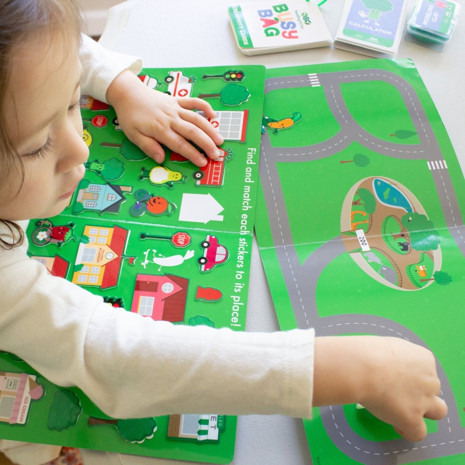 Avi's Adventures In The City Reusable Sticker Book + Marker Set (ages 3+)